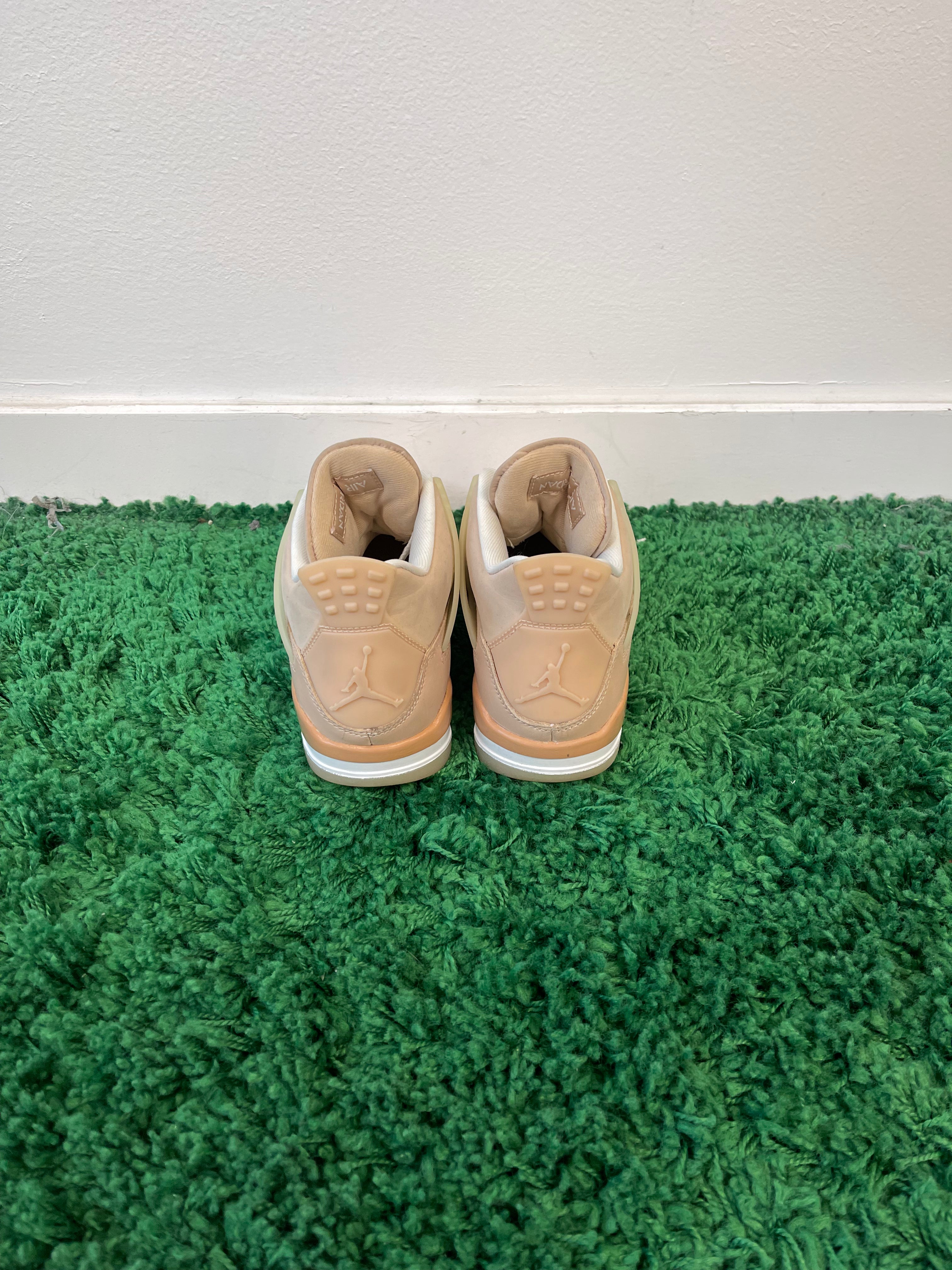 Used Jordan 4 Retro Shimmer (Women’s)